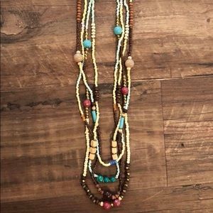 Long necklace with matching earnings